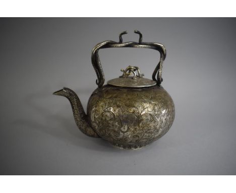 An Indian White Metal Teapot with Entwined Cobra Handle and Lid Finial. The Body decorated with Hindu Gods Dancing in Forest.