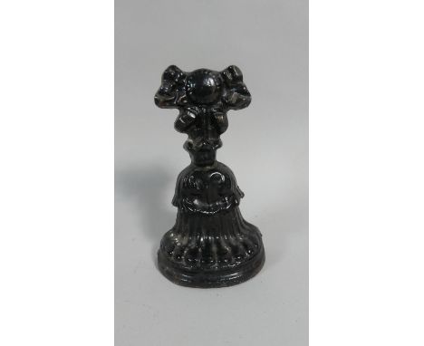 A Late 19th/Early 20th Century Door Porter, The Finial Decorated with Ribbon.