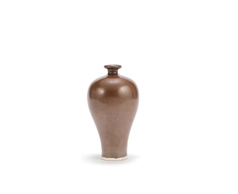 A RUSSET-GLAZED VASE, MEIPINGSong DynastyPossibly Ding ware, the baluster body rising to a short cylindrical neck with everte