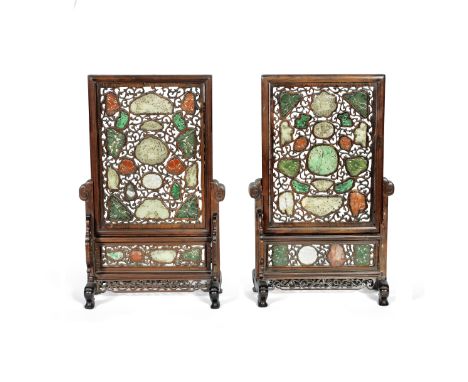 A PAIR OF JADE AND HARDSTONE INSET CARVED HONGMU TABLE SCREENSLate Qing DynastyThe openwork screens inset with a variety of j