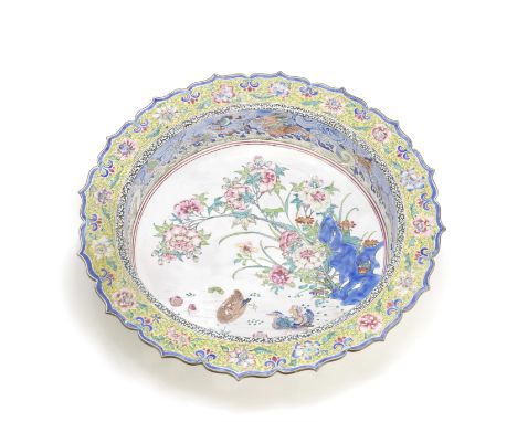 A PAINTED ENAMEL BASIN18th century Finely painted to the well with Mandarin ducks before a cluster of peonies issuing from bl