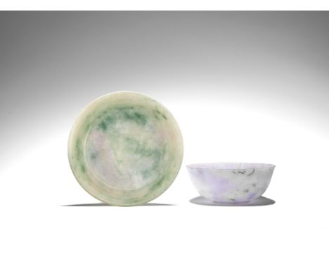 A JADEITE DISH AND A JADEITE BOWL19th centuryThe shallow dish with gently rounded sides, suffused with apple green inclusions