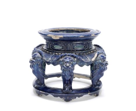 A FAHUA-TYPE STANDLate Ming DynastyOf circular section, modelled with a galleried rim supported by a reticulated mid-section 