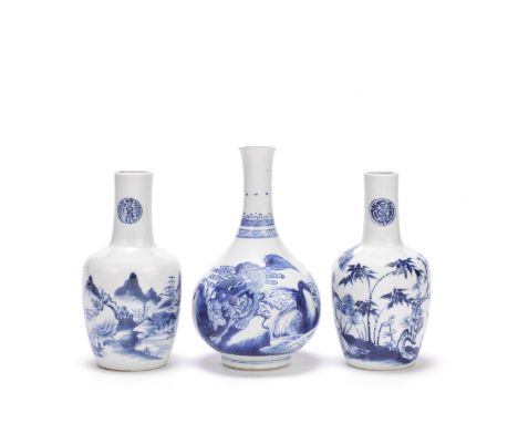 A BLUE AND WHITE 'KYLIN' BOTTLE VASE AND A RELATED PAIR OF VASESKangxi and 18th/19th centuryThe first decorated with two kyli