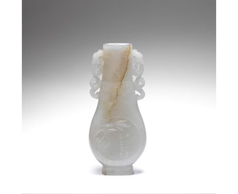 A PALE JADE FLATTENED PEAR-SHAPED VASEQing DynastyWith paired chilong handles, carved in shallow relief with a roundel of cal