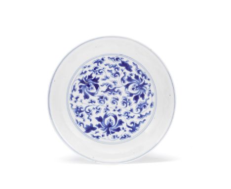 A BLUE AND WHITE 'LOTUS' DISHKangxi six-character mark and of the periodThe thinly-potted vessel painted in underglaze blue t