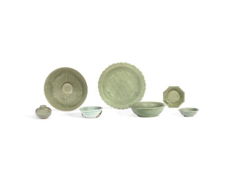 A GROUP OF SEVEN LONGQUAN CELADON GLAZED VESSELSSong to Ming DynastyComprising: a bracket rimmed dish incised with floral scr