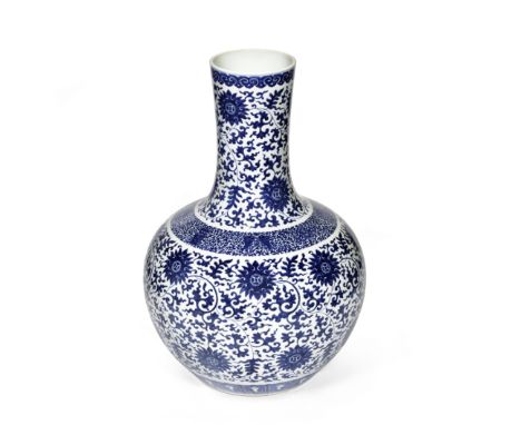 A LARGE BLUE AND WHITE 'LOTUS' BOTTLE VASE, TIANQIUPINGQianlong seal mark, late Qing DynastyThe tubular neck and globular bod