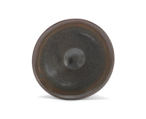 A JIAN WARE BOWLSong DynastyThe conical sides rising from a short foot, the body covered in a lustrous black glaze finely str