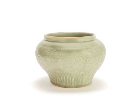 A LONGQUAN CELADON JARMing DynastyOf baluster form, carved to the exterior with a lotus meander above a band of petal-form la