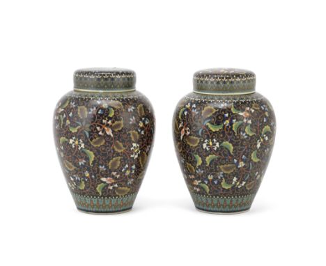 A PAIR OF CLOISONNÉ-ENAMEL ON PORCELAIN VASES AND COVERSBy Takeuchi Chubei, Meiji PeriodEach decorated with undulating leafy,