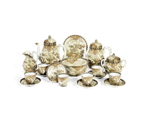 A FUKAGAWA PORCELAIN TEA SERVICECirca 1900Comprising: a teapot and cover, a hot water pot and cover, a sugar bowl and cover, 