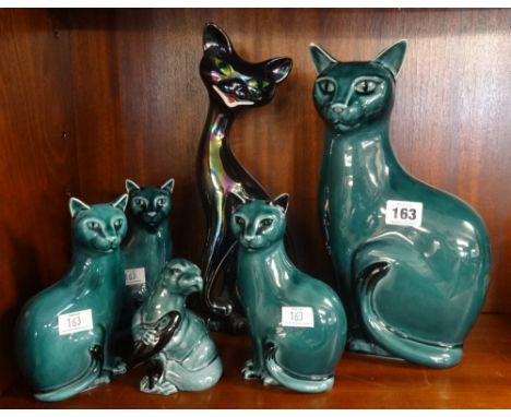 A collection of Poole Pottery cats ornaments and others (7).
