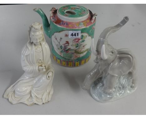 A Nao porcelain elephant, Chinese porcelain teapot and a Chinese white porcelain figure (badly damaged).