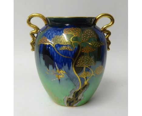 Carlton Ware, a lustre art pottery twin handled vase decorated with stylised birds and trees, height 24cm.