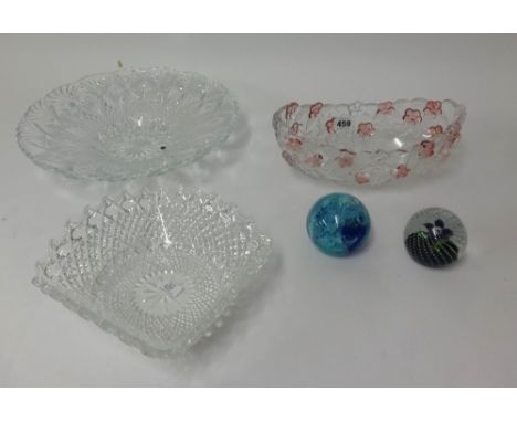Three 20th Century moulded glass tableware's, a Caithness 'High Seas' paperweight and another.