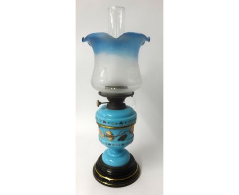 Victorian oil lamp with decorated blue reservoir, height to the top of the shade 45cm.