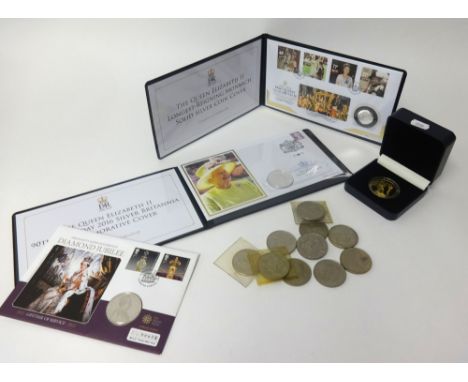 A collection of various commemorative coins including Jubilee Mint first day covers, London Mint QEII collection medal, loose