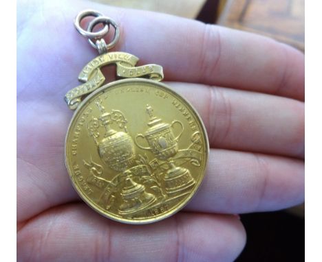 Aston Villa Football Club, a Victorian  18ct gold medallion inscribed 'Presented to G.B.Ramsay Esq, By the members in gratefu