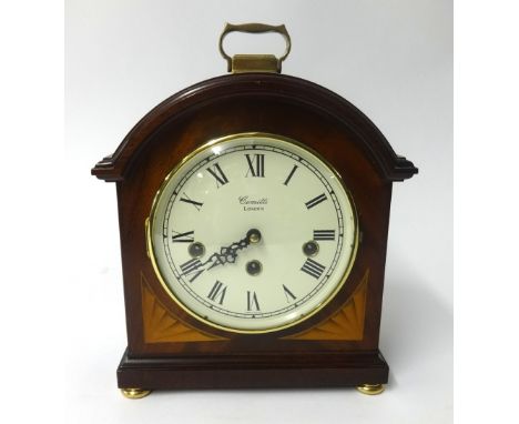 Comitti, London, a mahogany cased chiming bracket clock with key, height 29cm.