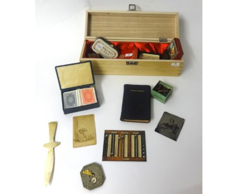 A modern pocket sundial and compass together with a box of various booklets, vintage items, studs etc.