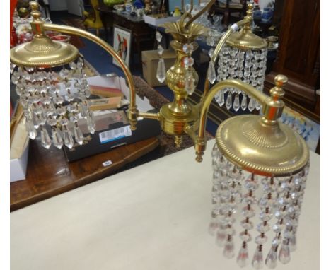 A three arm brass and cut glass chandelier together with a 1920's Bar Let typewriter.