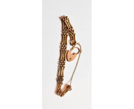 A gate link bracelet stamped '9CT', length 18.5cm.  Gross weight 12.5 grams. 