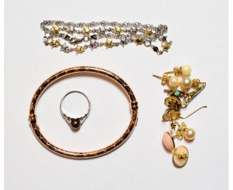 A 9 carat rose gold bangle; a 9 carat gold cultured pearl ring, finger size M; a bracelet stamped '9K'; a star link bracelet 