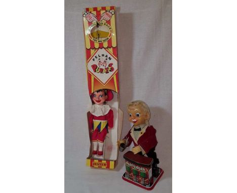 Pelham puppet 'Jester' in original box and tinplate 'Bartender' clock work toy