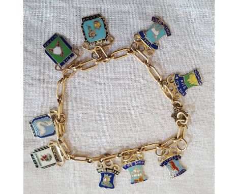 9ct gold open link charm bracelet with enamel fobs in the form of pub signs (total weight 15 grams)