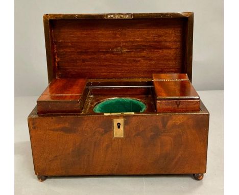 A mahogany tea caddy with inserts to sides (missing its glass liner)