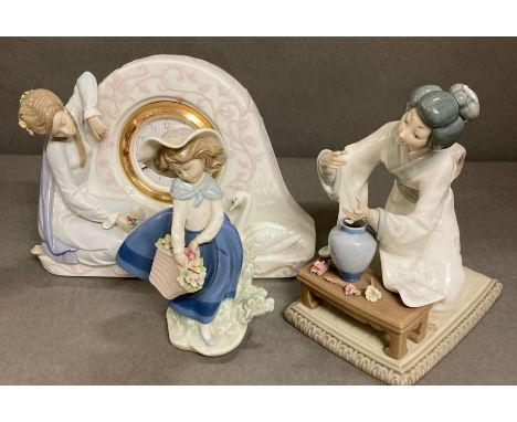 Three pieces of Lladro including a clock 
