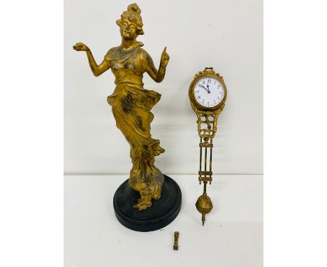 A Gilt clock in the form of a lady AF