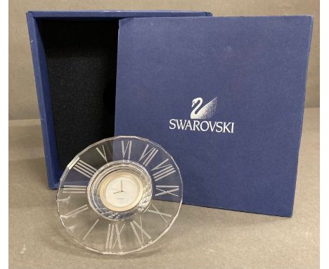 A Boxed Swarovski clock.
