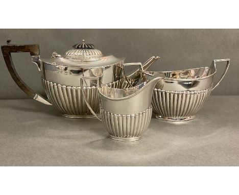 A Three piece silver tea service to include Teapot, milk jug and sugar bowl.(Total Weight 900g) by The Alexander Clark Manufa