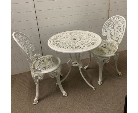 A white metal garden bistro set, table and two chairs (Table 68 cm D x H 67 cm)