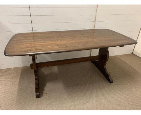 A dining table, possibly Ercol, (184 cm x 87cm x 74cm)