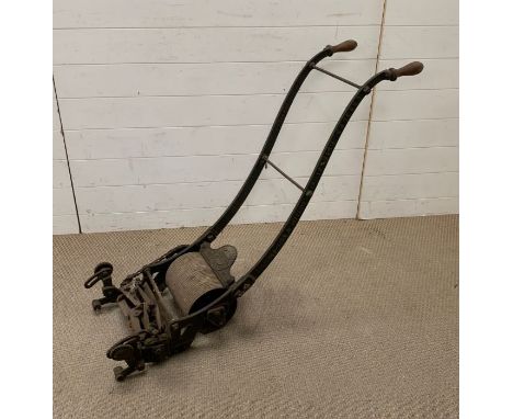A vintage push lawn mower with roller by Ransoms' 