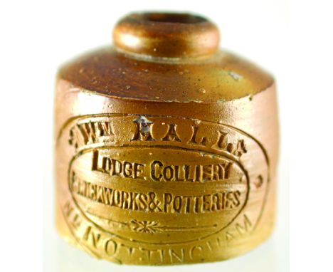 NOTTINGHAM COLLIERY INKWELL. 1.75ins tall, brown glazed circular inkwell impressed WM HALL/ LODGE COLLIERY/ BRICKWORKS & POTT