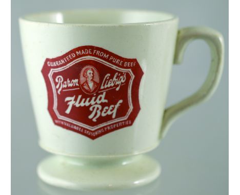 LIEBIGS ADVERTISING MUG. 3.25ins tall, white glaze with white lettering on brown GUARANTEED MADE FROM PURE BEEF BARON LIEBIGS