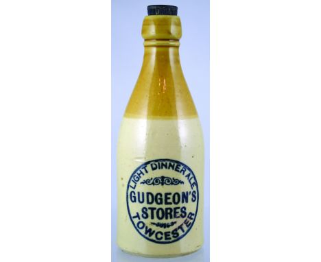TOWCESTER LIGHT DINNER ALE BOTTLE. 9ins tall, ch. t.t. black transfer LIGHT DINNER ALE/ GUDGEONS/ STORES/ TOWCESTER. Price Br