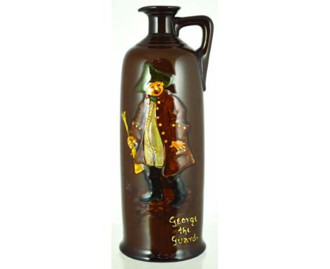 GEORGE THE GUARD. (JL pg 26) 9.75ins tall, charcter in relief to front, title below GEORGE THE GUARD with DEWARS/ SCOTCH WHIS