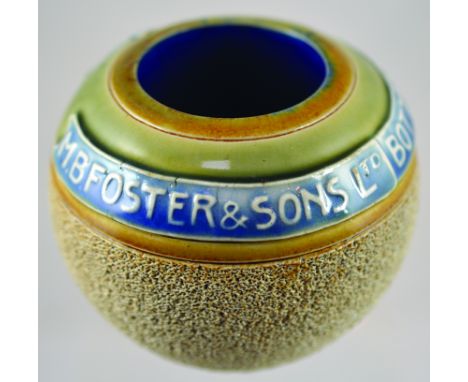 M B FOSTER &amp; SONS MATCHSTRIKER. 3ins tall. 4ins wide, brown, green &amp; pale blue glaze. Striking area below M B FOSTER 