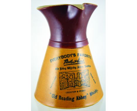 READING ABBEY WHISKY PUB JUG. 8ins tall, brown top, lower tan glaze, black transfer EVERYBODYS FAVOURITE/ BUTLER &amp; SONS/ 