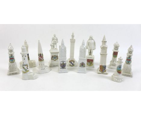 A collection of crested china monuments and clock towers, including a Devonia Art China monument of Drake, with Plymouth cres