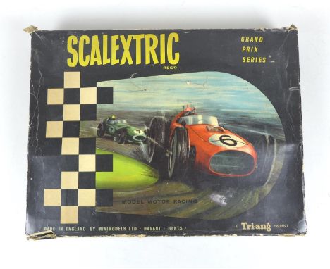 A vintage Scalextric racing set GP1 and accessories, Grand Prix Series, circa 1963, in original box including two racing cars