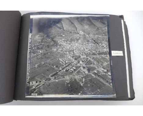 A WWII photograph album containing approximately 472 images taken by Captain Edward Phillips, Official photographer of the Ei