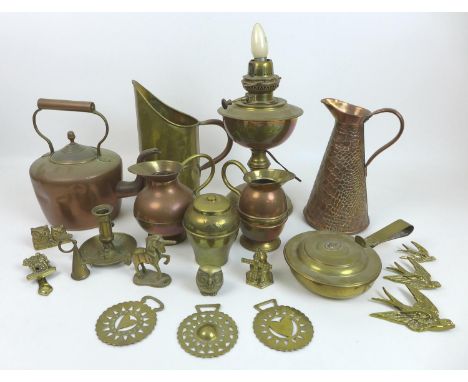 A group of copper and brass items, including an electric oil lamp, a crocodile skin embossed copper ewer, and a brass Lipton'