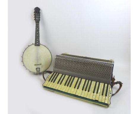 A Hohner Tango III piano accordion with case, and a mandolin banjo with damaged neck and case, a/f. (2) 