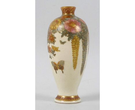 A good Japanese Satsuma pottery miniature vase, Meiji period, of slender ovoid form with flared gilt rim and spreading foot, 